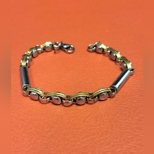 Stainless steel silver and gold tone bracelet